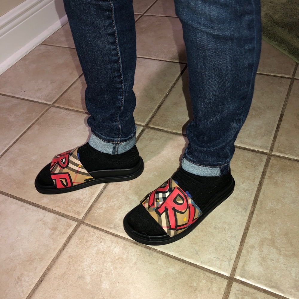 Burberry slides. Brand new. Never worn.